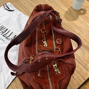 MZ WALLACE 9 inches tall. 13 inches long , deep red two strap bag.